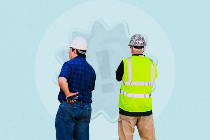 Construction workers back view.