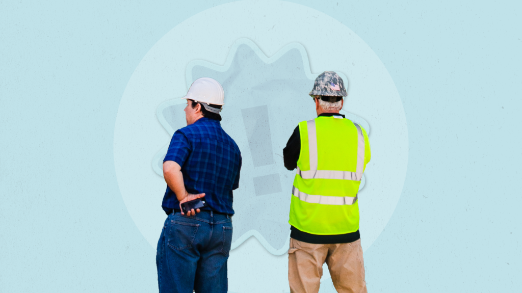 Construction workers back view.